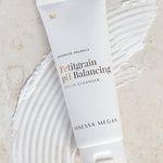 Vanessa Megan Petitgrain Cream Cleanser tube on a swipe of product