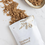 Vanessa Megan Rapadura and Wattleseed Body Buff pouch with scrub