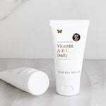 Vanessa Megan Vitamin A B C Daily Face Cream SPF15 tube on marble