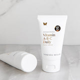 Vanessa Megan Vitamin A B C Daily Face Cream SPF15 tube on marble