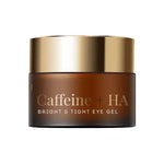 A dark brown cosmetic jar with a metallic gold lid, labeled 'Caffeine + HA BRIGHT & TIGHT EYE GEL' on a plain white background.