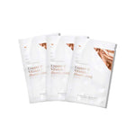 Three Vanessa Megan Copper & Vitamin C Illuminating Sheet Mask packets are arranged overlapping on a white background. The packaging features copper accents, emphasizing vitamin C benefits and collagen support.