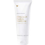 A white 180ml tube of Vanessa Megan Hibiscus & Banksia Mattifying Cream Clay Mask with minimalist gold and grey text and a gold butterfly icon—an ideal purifying treatment for oily and combination skin.