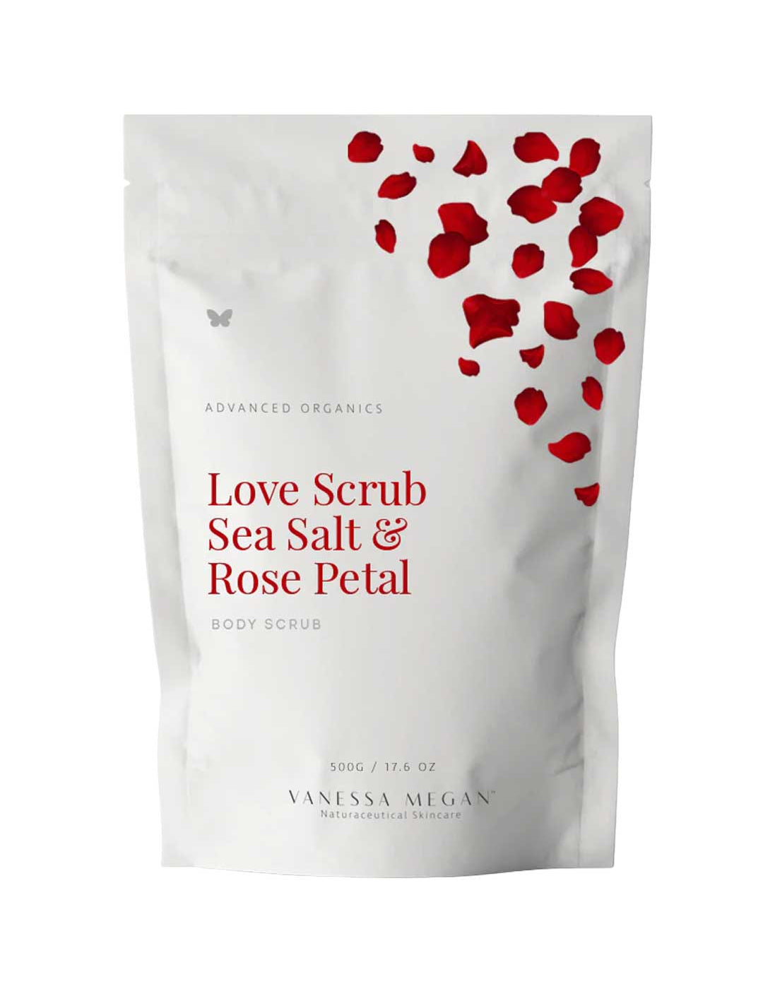 A white pouch labeled Vanessa Megan Love Scrub Sea Salt & Rose Petal 500g, featuring red rose petals at the top and highlighting a natural exfoliator with sea salt scrub benefits. Weight: 500g / 17.6 oz.