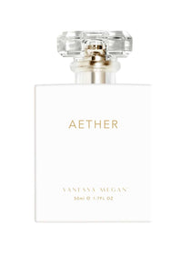 A white rectangular bottle labeled "Vanessa Megan Aether 100% Natural Perfume" in gold, with VANESSA MEGAN and 50ml e 1.7FL OZ below, topped by a clear faceted cap—an elegant vegan fragrance choice.