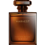 The Vanessa Megan Harvest 100% Natural Perfume comes in a minimalist brown glass bottle labeled HARVEST, with VANESSA MEGAN and 50ml e 1.7 FL OZ beneath, topped with a matching brown cap for an elegant, luxurious look.