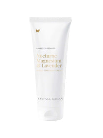 A white tube of Vanessa Megan Nocturne Magnesium & Lavender Night-Time Body Cream 180ml, with minimalist gold and black text and a gold butterfly near the top—ideal as a soothing night-time moisturiser.