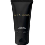 A black tube labeled with gold and white text contains Vanessa Megan Perfume Hand & Body Cream Wild Woud 50ml—an organic, vegan cream for hands and body.