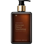A brown pump bottle of Vanessa Megan Peruvian Flower Nourishing Hand & Body Cream 280ml, with gold text and a butterfly icon, is displayed as a luxurious vegan body cream against a white background.
