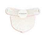 The Vanessa Megan The Butterfly Effect Medical-Grade Silicone LED Neck Mask features a white, abstract butterfly-shaped design with gold dotted lines, trimmed in pink for a chic look—perfect for at-home skincare treatments.
