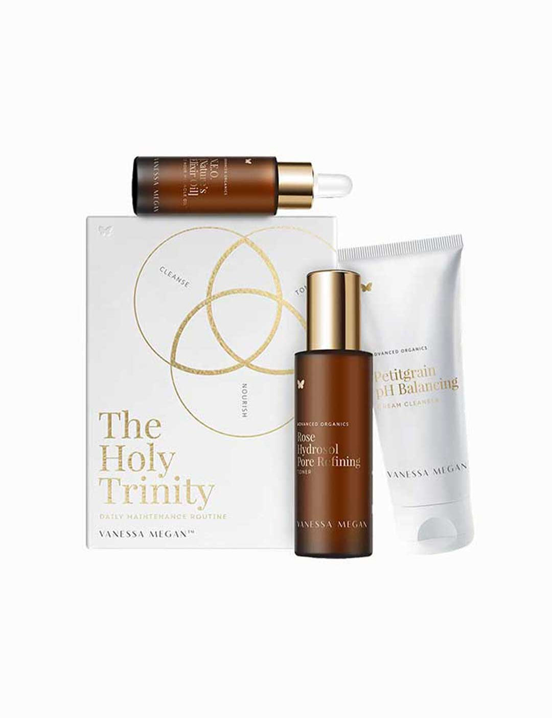 Vanessa Megan The Holy Trinity Daily Maintenance Full Routine is a plant-based skincare set in a gold-accented box, featuring a dropper bottle, spray bottle, and Petitgrain pH Balancing tube to elevate your daily routine.