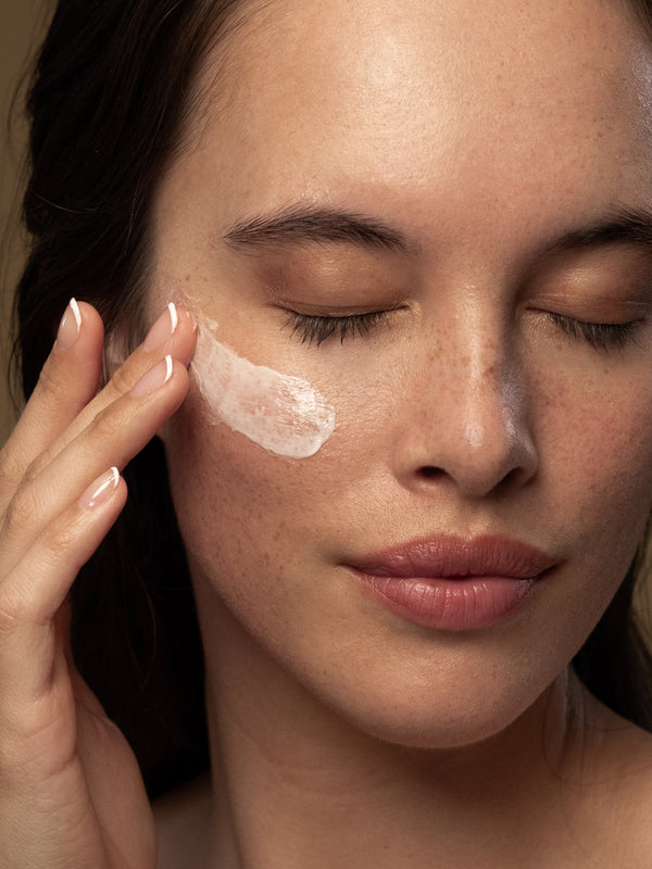 Model applying Antipodes Vanilla Pod Hydrating Day Cream