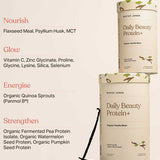Two tubs of Mister Jones Daily Beauty Protein+ Organic Vanilla Bean 900g sit on a beige surface. This plant-based protein powder supports gut health and helps nourish, glow, energise, and strengthen with premium ingredients.