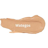 A smear of Eco Minerals Mineral BB Cream 32ml with a natural finish is shown on a white background, featuring the word Wategos in white letters across the center.