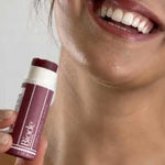 Model wearing Biode Waratah Lip and Cheek Tinted Balm, SKU LBW10