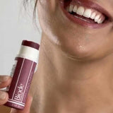 Model wearing Biode Waratah Lip and Cheek Tinted Balm, SKU LBW10