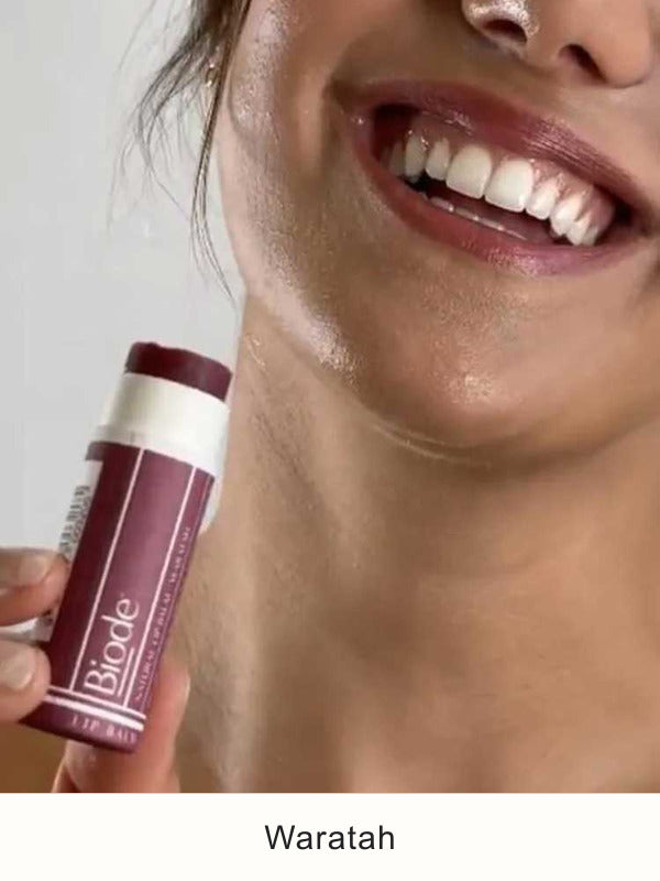 Model wearing Biode Waratah Lip and Cheek Tinted Balm, SKU LBW10