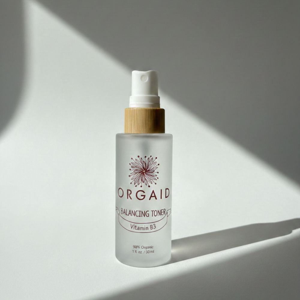 Orgaid Balancing Toner in soft window light