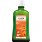 The Weleda Arnica Muscle Soak Bath Milk 200ml comes in a green bottle with an orange label featuring marigold flowers and is described as a natural bath milk to relax, soothe tired muscles, and support muscle recovery.