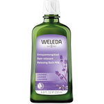A green 200ml bottle of Weleda Lavender Milk Bath with a white cap and a purple label featuring lavender illustrations, highlighting its aromatherapeutic benefits in German, French, and English for a relaxing experience.