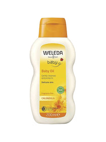 A 200 ml white plastic bottle of Weleda Calendula Baby Oil Fragrance Free with a yellow cap and label decorated with calendula flowers; the label states it’s for delicate skin.