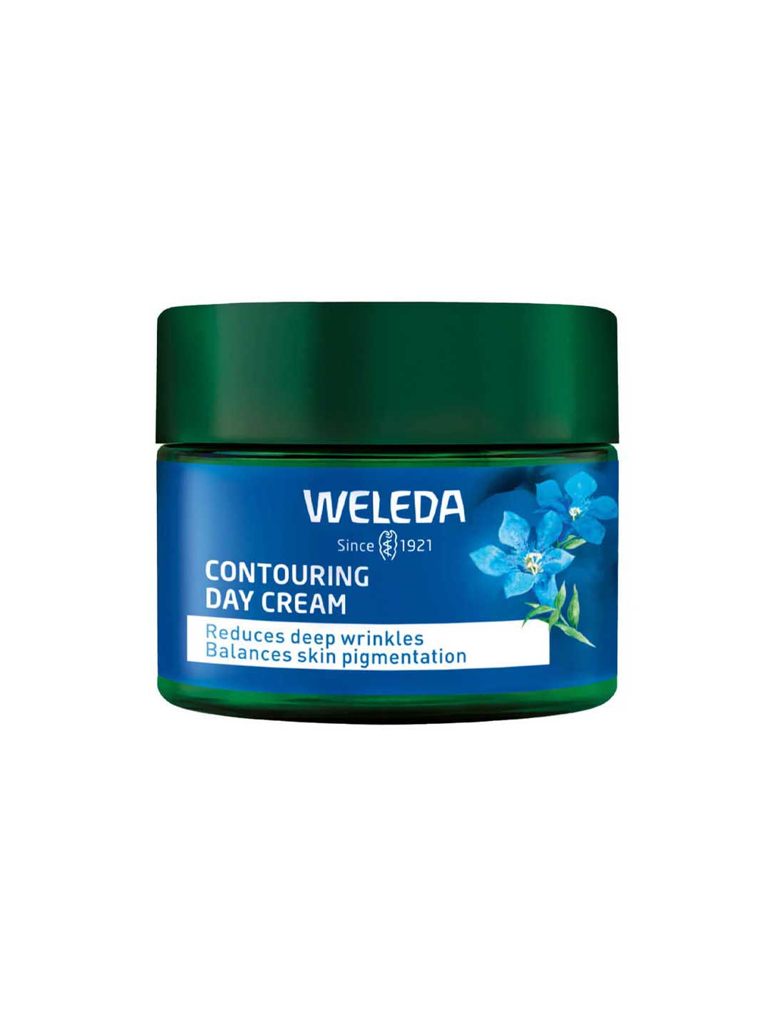 A jar of Weleda Contouring Day Cream Blue Gentian & Edelweiss with a dark green lid and blue label featuring blue flowers. The label highlights Blue Gentian extract to reduce deep wrinkles and balance skin pigmentation.