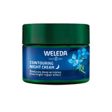 A 40ml jar of Weleda Contouring Night Cream Blue Gentian & Edelweiss with a dark green lid and blue label. This anti-aging formula reduces deep wrinkles and supports overnight skin barrier repair for smoother, revitalized skin.