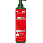 A 250ml red bottle of Weleda Firming Serum Body Lotion Pomegranate with a green pump, featuring a label with pomegranate graphics and highlighting peptides and Peptide+Pomegranate Complex for firmer skin.