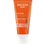 A 75ml orange tube of Weleda Foot Balm with a white cap, labeled in English and French, features myrrh and rosemary to soften tough skin and refresh dry, tired feet after activity.