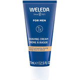 A 75ml tube of Weleda For Men Shaving Cream for sensitive skin, featuring a blue design with a white cap and minimalist white text, labeled "Smooth and gentle shaving" in English and French.