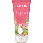 Weleda Happiness Shower Gel Grapefruit 200ml comes in a pink tube with an illustration of a woman amid grapefruit and flowers, featuring a mood-lifting natural grapefruit fragrance.