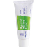 Weleda Hypercal Healing Cream 36ml comes in a white tube with a green label and white cap. Ideal for natural first aid, it soothes and relieves painful cuts and wounds, as noted on the label.