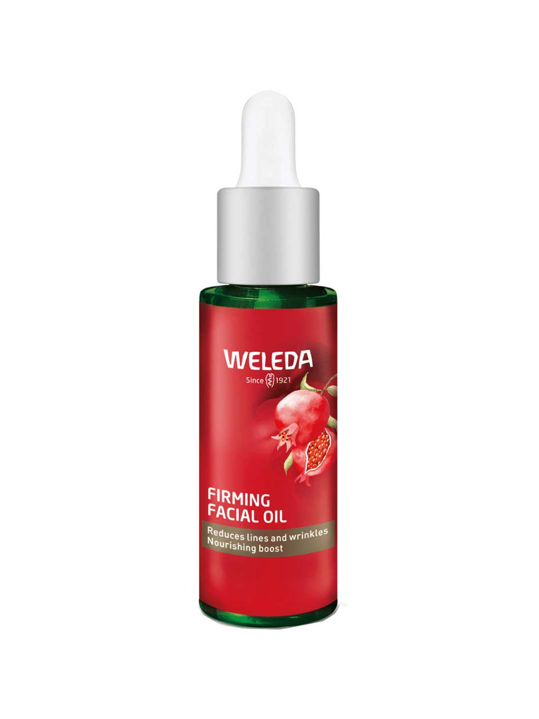 A green glass bottle of Weleda Pomegranate Firming Facial Oil 30ml with a white dropper cap and red label featuring a pomegranate image, highlighting pomegranate seed oil for reducing lines and nourishing mature skin.