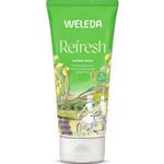 A green 200 ml tube of Weleda Refresh Citrus Body Wash, a natural cleanser with a citrus scent. The packaging shows cyclists in the countryside with lemons and lavender, emphasizing its refreshment from lemon oil.