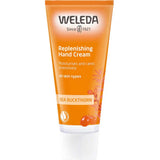 A 50ml orange tube of Weleda Replenishing Hand Cream Sea Buckthorn for all skin types, with a white cap; this natural cream moisturizes and cares for your hands.