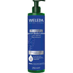 Weleda revitalising serum body lotion bottle on a white background