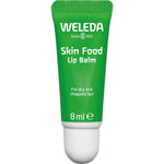 Weleda Skin Food Lip Balm 8ml is a green tube with a white cap, labeled “For dry and chapped lips.” This natural balm offers intensive lip care in a handy size, featuring white branding.