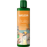 A 400ml bottle of Weleda Vitality Sea Buckthorn Shower Cream, a natural vegan body wash with a green cap and orange label, features sea buckthorn berries, a woman in a yellow scarf, lighthouse, and certification logos.