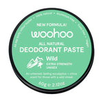 Green container of woohoo all natural deodorant paste with Wild Extra Strength branding on a white background