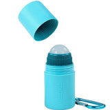 A turquoise blue deodorant stick with its cap removed and floating above, shown on a clean white background. The container has a matching blue carabiner attached to the side, and the brand name 'watom' is printed vertically on the front.