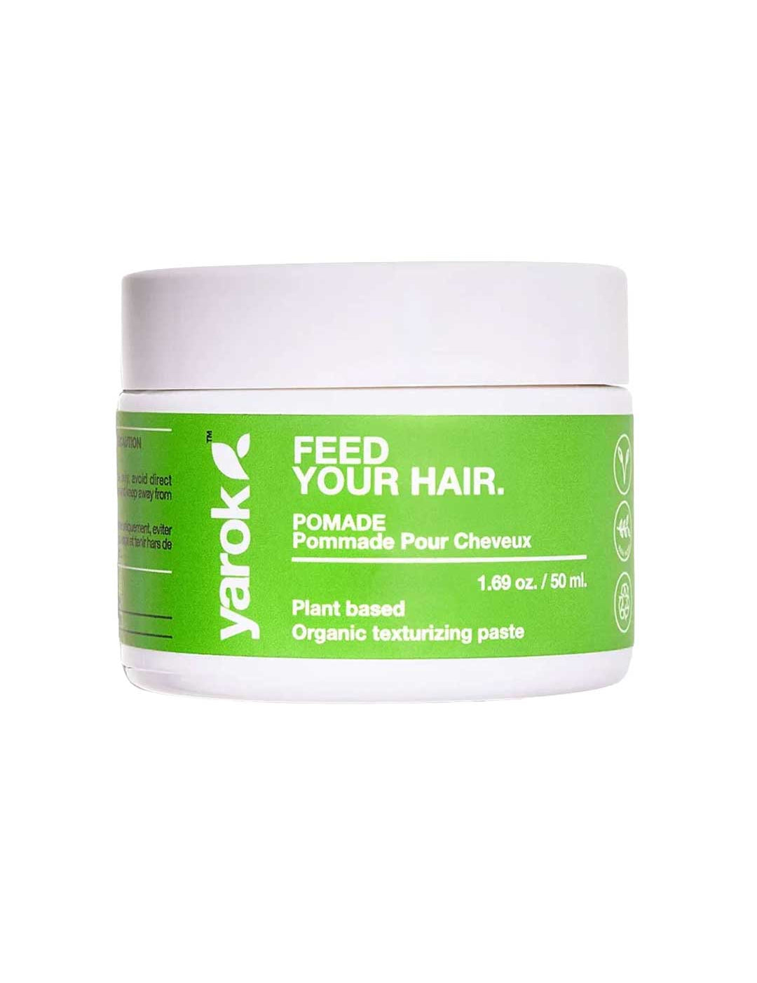 A white plastic jar of Yarok Feed Your Hair Pomade with a bright green label, set against a plain white background.