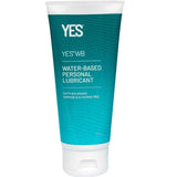 A tube of Yes WB Water-Based Personal Lubricant by Yes, with a teal label and white text stating it’s organic, hormone-free, and glycerine-free. The tube features a white flip-top cap.