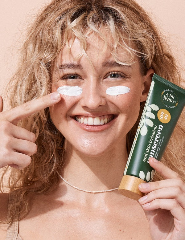 A bit Hippy SPF 40 Sunscreen applied to the cheeks