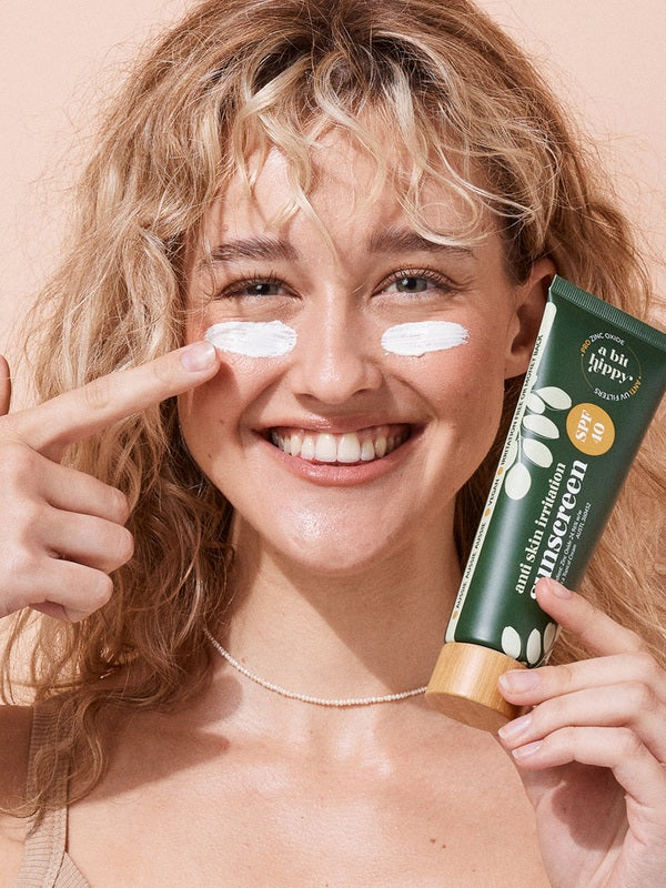 A bit Hippy SPF 40 Sunscreen applied to the cheeks