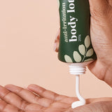 A bit Hippy Body Lotion dispensed into a hand