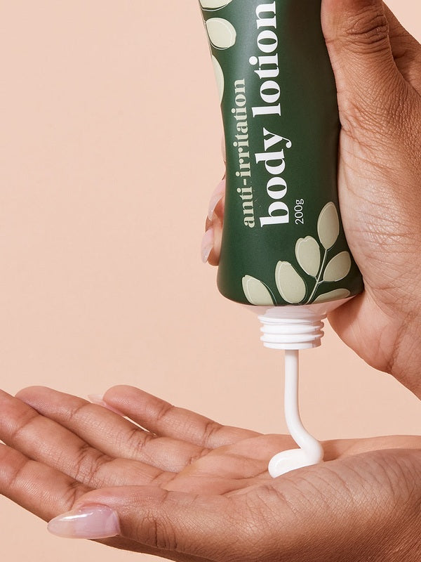 A bit Hippy Body Lotion dispensed into a hand