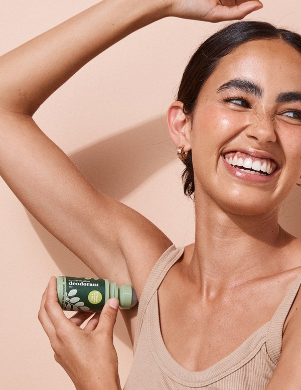 A bit Hippy Bergamot Deodorant being applied underarm