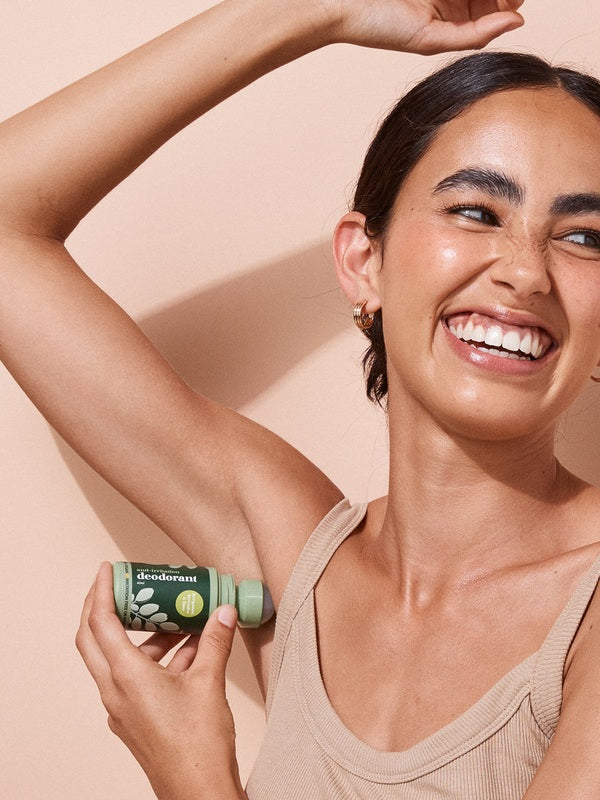 A bit Hippy Bergamot Deodorant being applied underarm