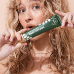 A bit Hippy Face Cream held by a woman