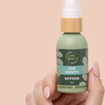 A bit Hippy Hair Growth Serum held in hand